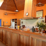 Our large shared kitchen - with views out to the ocean!